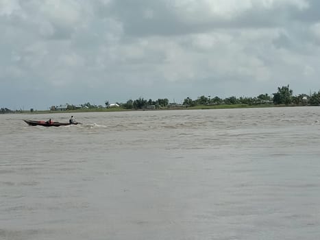 river and sky view with nature and boat