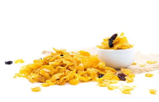 Conflakes caramel and cereal on a white background