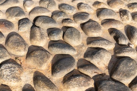 Old natural stone wall, background, texture or pattern. Rustic texture. Wall with bricks of italian stones.