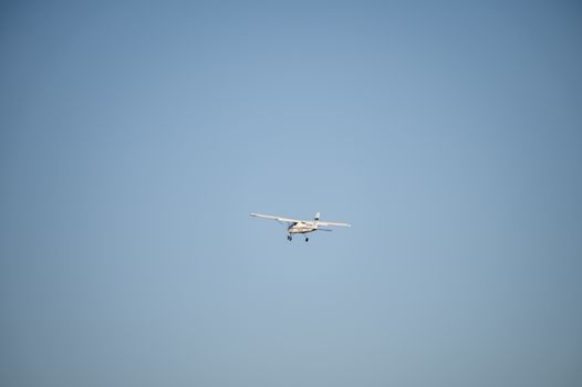 school plane at high altitude during a lesson on a sunny day