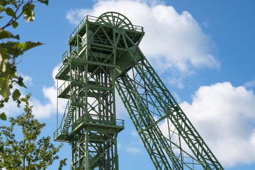 KAMP-LINTFORT, GERMANY - AUGUST 22, 2020: Old pitframe of Zeche Friedrich Heinrich against sky, industrial heritage of Germany on August 22, 2020 in Kamp-Lintfort