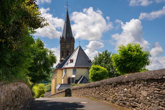 Panoramic image of the old Parish Church of Lieser close to Bernkastel on a sunny day, Moselle, Germany