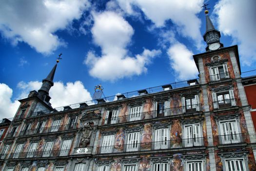 Beautiful main square in Madrid called Plaza Mayor with its majestic facades in a sunny day of Spring