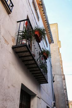 Old stone facades in Caravaca de La Cruz village, Murcia, Spain