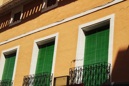 Colorful and majestic old house facade in Caravaca de La Cruz, Murcia, Spain in a sunny day of Spring