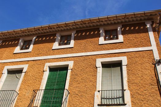 Colorful and majestic old house facade in Caravaca de La Cruz, Murcia, Spain in a sunny day of Spring