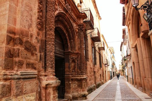 Narrow streets with Renaissance style houses and carved facades in Alcaraz, Castile-la Mancha community, Spain