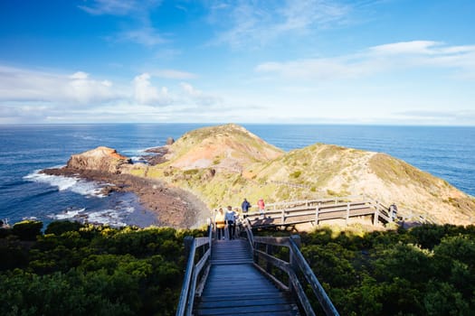 The famous Cape Schanck boardwalk runs towards the sea and rock formation known as London Bridge, in Victora. Australia