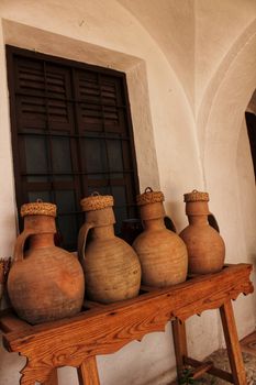 Clay pots for water in a typical courtyard of a Spanish house in Castile-la Mancha