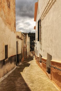 Narrow streets and old facades in Jorquera village, Castilla la Mancha community, Spain