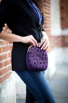 purple Elegant Felting wool fashion handmade handbag in hand. street fashion look