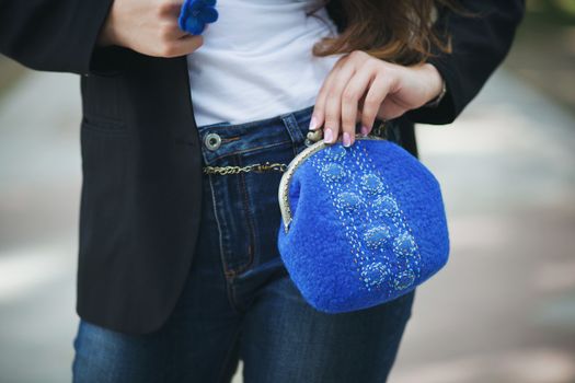 blue Elegant Felting wool fashion handmade handbag in hand. street fashion look
