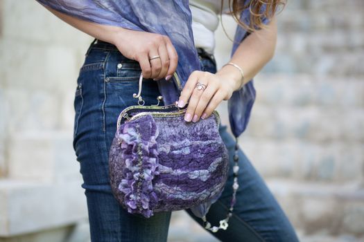 purple Elegant Felting wool fashion handmade handbag in hand. street fashion look