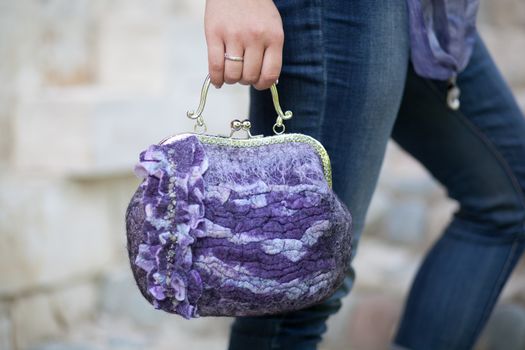 purple Elegant Felting wool fashion handmade handbag in hand. street fashion look