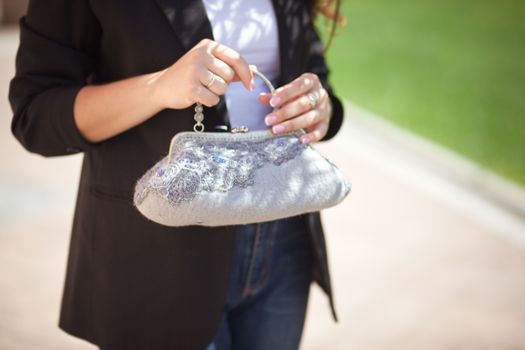 gray Elegant Felting wool fashion handmade handbag in hand. street fashion look