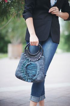 emerald Elegant Felting wool fashion handmade handbag in hand. street fashion look