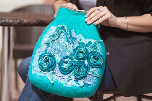 emerald Elegant Felting wool fashion handmade handbag in hand. street fashion look