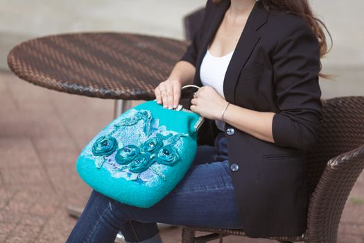 emerald Elegant Felting wool fashion handmade handbag in hand. street fashion look