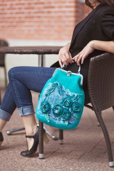 emerald Elegant Felting wool fashion handmade handbag in hand. street fashion look