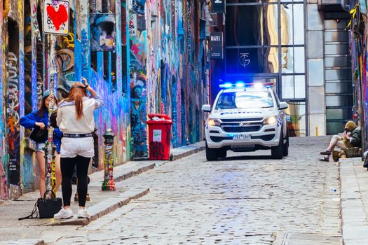Melbourne, Australia - October 10th 2020: Police do routine checks against pandemic rules in Hosier Lane during the Coronavirus pandemic and associated lockdown.