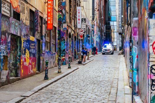 Melbourne, Australia - October 10th 2020: Police do routine checks against pandemic rules in Hosier Lane during the Coronavirus pandemic and associated lockdown.