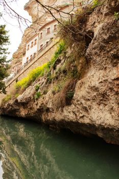 Water channel in Alcala del Jucar and vegetation