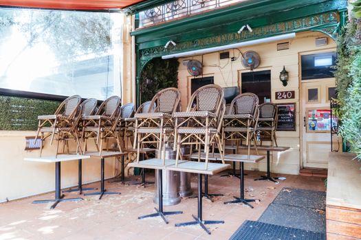 Melbourne, Australia - October 10th 2020: Lygon St restaurants are closed and packed up empty during the Coronavirus pandemic and associated lockdown.