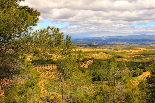 Landscape of the sierra of Utiel Requena in Valencia, Spain under cloudy sky in spring