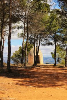 Tower between pine forest in the Utiel mountains in spring