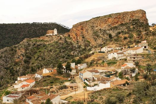 Views of the town of Villa de Ves between mountains and on top of the Sanctuary. Community of Castilla La Mancha, Albacete, Spain.