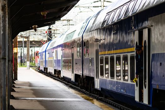 Changes and complications caused by coronavirus COVID-19 virus, world without crowds, empty train platform. No commuters, no travelers at the North Railway Station in Bucharest, Romania, 2020