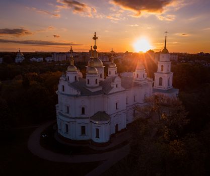 Vivid aerial view on the architecture of Poltava city at autumn sunny evening, Ukraine