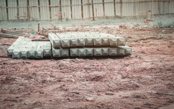 pile concrete pillars on ground in construction site