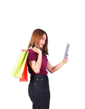 woman holding paper bags green and orange shopping And mobile phone. on white background