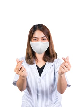 woman showing mini heart sign and wearing fabric mask safety Covid-19 or coronavirus on white background