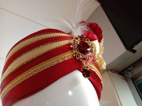 The groom's hat on head of toy man for sell