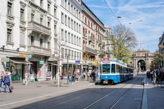 Zurich, Switzerland - 29 March : a tram passing along Bahnhofbrucke bridge in the city of Zurich. Trams make an important contribution to public transport of the city at 29 March 2017