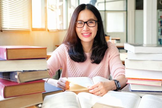 Young woman studying in library