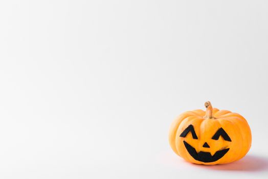 Funny Halloween day party concept ghost pumpkin head jack lantern scary smile, studio shot isolated on white background, Holiday decoration