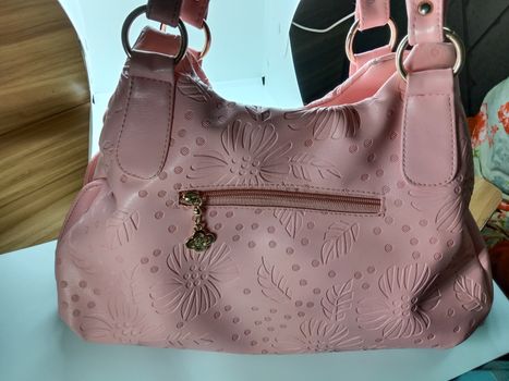 pink colored stylish woman's side bag for sell
