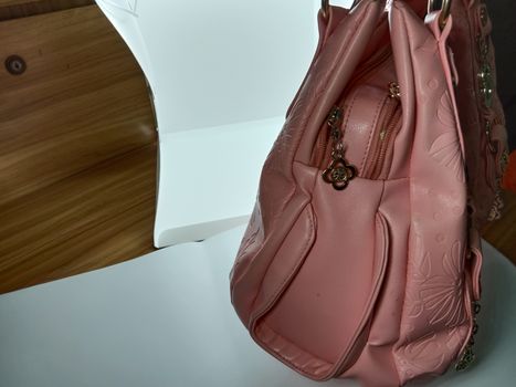 pink colored stylish woman's side bag for sell