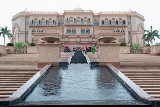 Abu Dhabi, United Arab Emirates, March 2013: Outdoor front entrance and facade of the Emirates Palace Hotel in Abu Dhabi