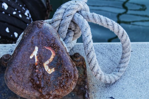 Ropes of a boat moored at the dock