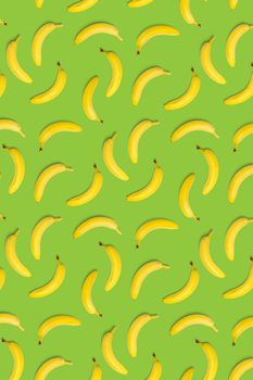 Bananas creative background. pop art bananas background. Tropical abstract background with banana. Colorful fruit yellow banana, not pattern