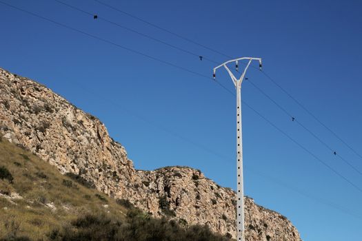 High voltage towers in the mountain