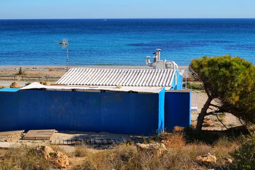 Old blue cabin on the beach in Santa Pola, Alicante