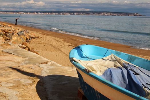 Fishing boats on the shore in the morning
