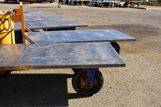 Metal trolleys to carry boxes of fish in the fishing port in Santa Pola, Alicante