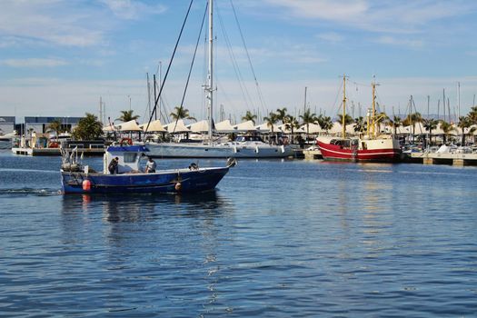 Fishing boat entering port in southern Spain