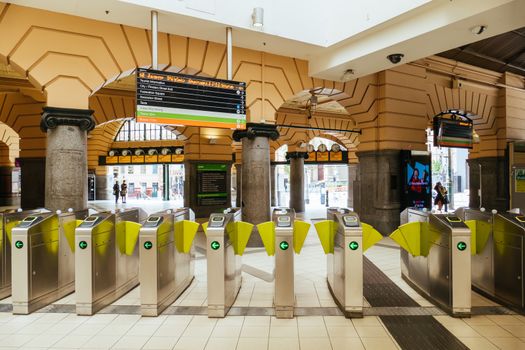 Melbourne, Australia - October 18, 2020: Flinders St Station in Melbourne is quiet and empty during the Coronavirus pandemic and associated lockdown.
